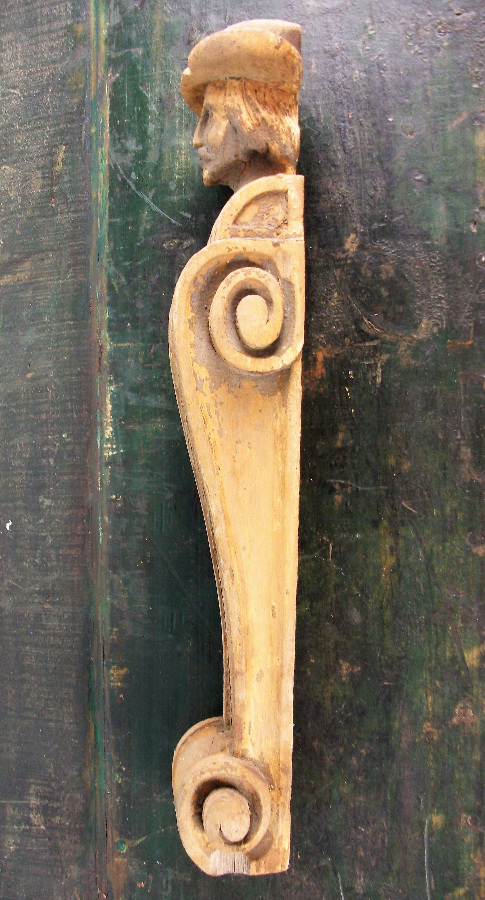 Man with Hat Carving